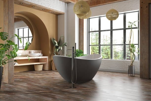 Small bathroom with large uncovered windows and bright sunlight.