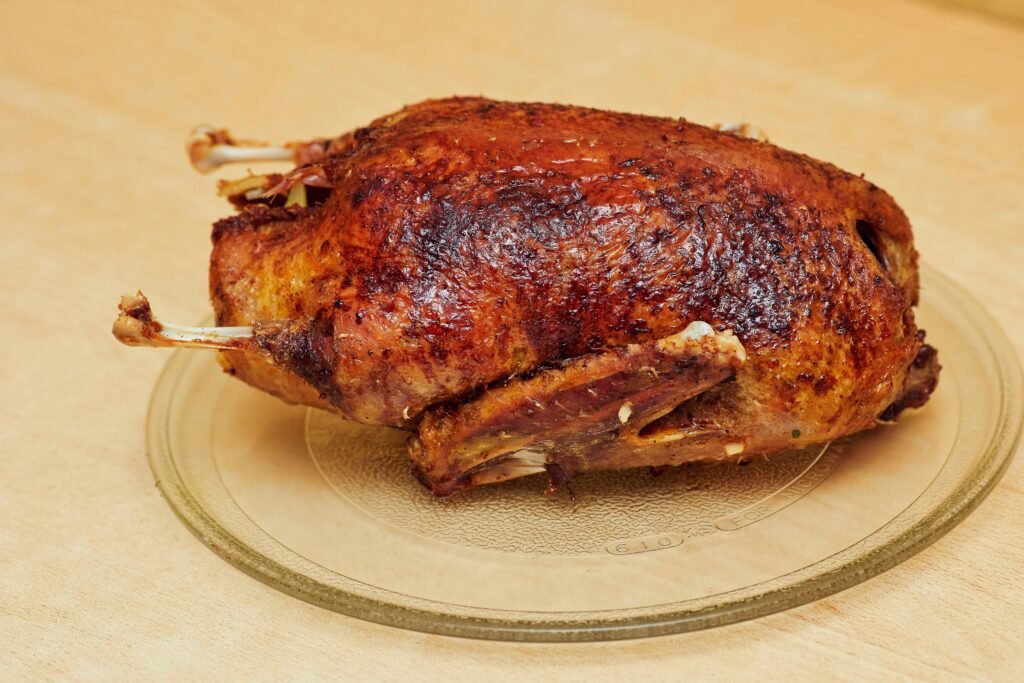 Cooking Turkey Breast prepared with herbs and spices for a juicy homemade meal.