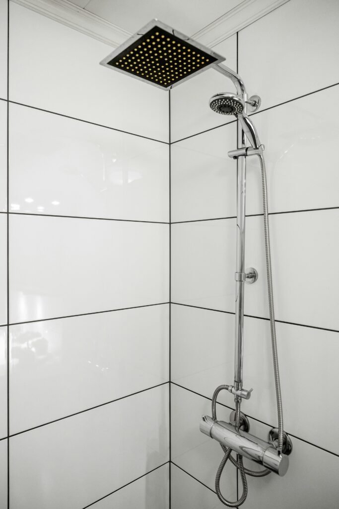 How to Fix Leaking Shower Head featuring DIY leak repair, washer replacement, drip prevention, water-saving tips, and shower maintenance.
